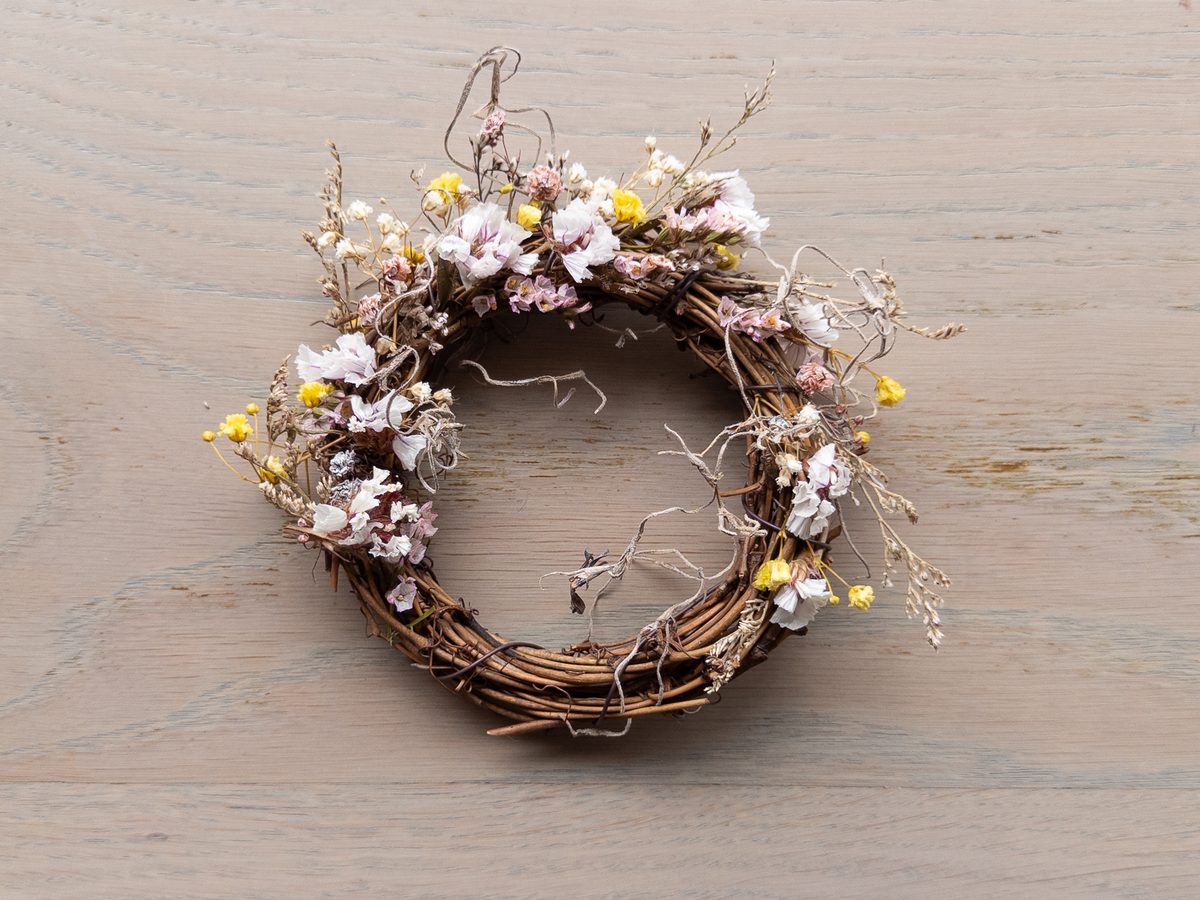 Delicate preserved floral wreath with ribbon